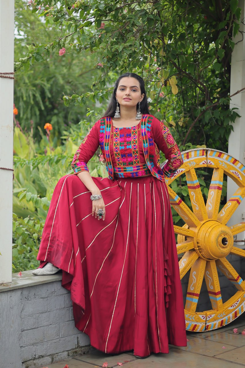 Maroon Roman Fabric With Kutchi Gamthi Embroidered Work Navratri Lehenga Choli