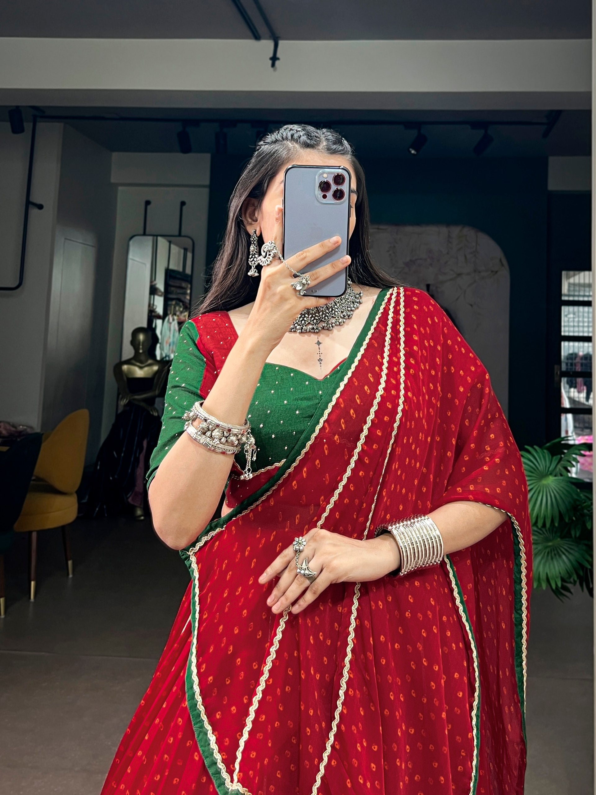 Red & Green Bandhej Print On Satin Chiffon, Enhanced With Gotta Patch Work And A Beautifully Crafted Dola Silk Navratri Chaniya Choli Set