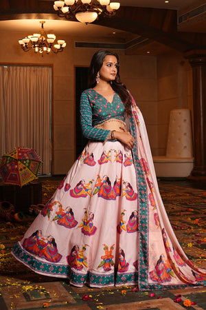 Baby Pink and Teal Green Crepe Navratri Lehenga Choli featuring traditional Garba dancing motifs and printed work by The Beauty Queen.
