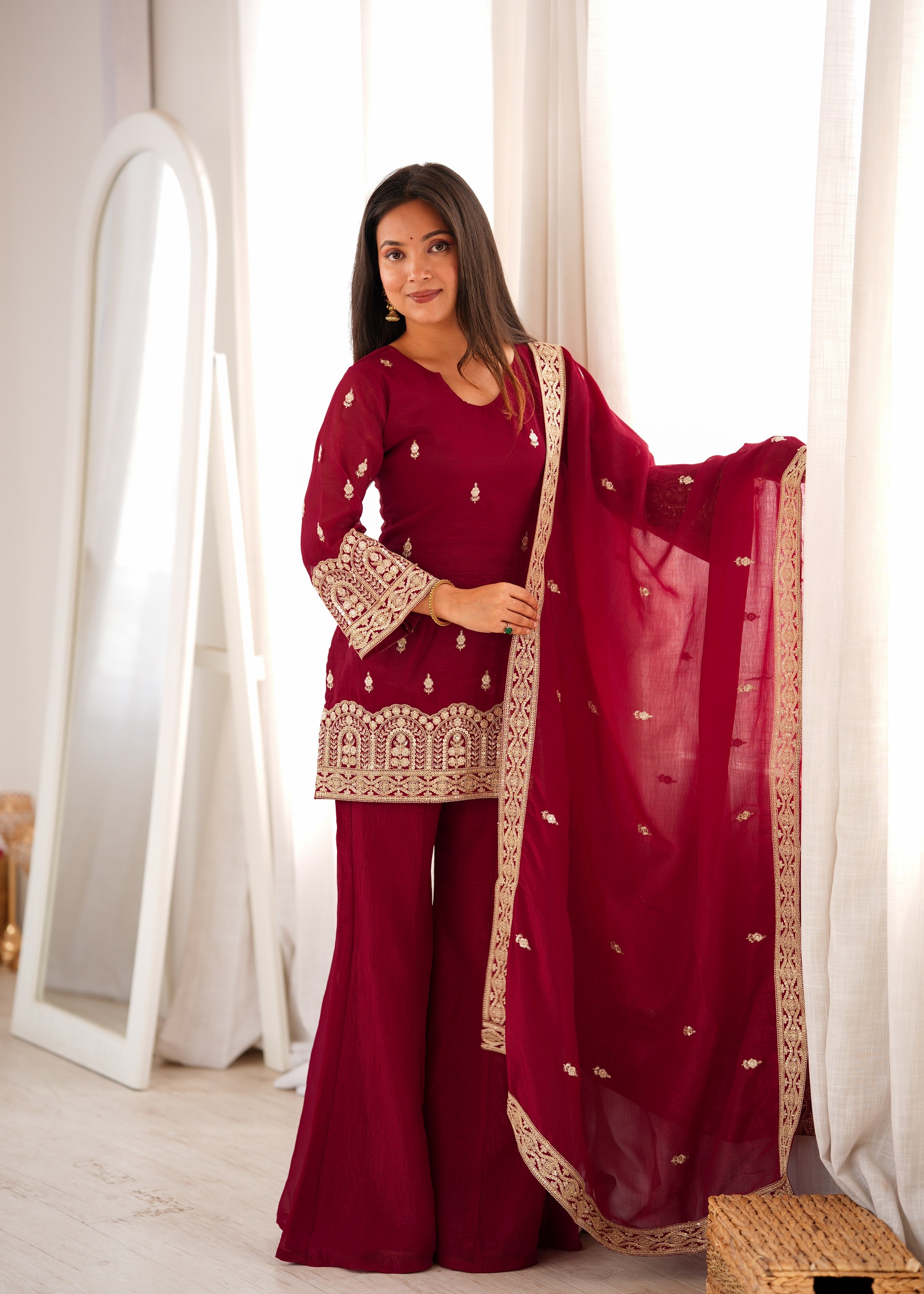 Burgundy Maroon Crunch Silk Short Kurti Sharara Suit Set with Heavy Sequin, Dori & Zari Architectural Border Embroidery, Flared Sharara Pants & Embroidered Silk Dupatta with Fancy Back Dori