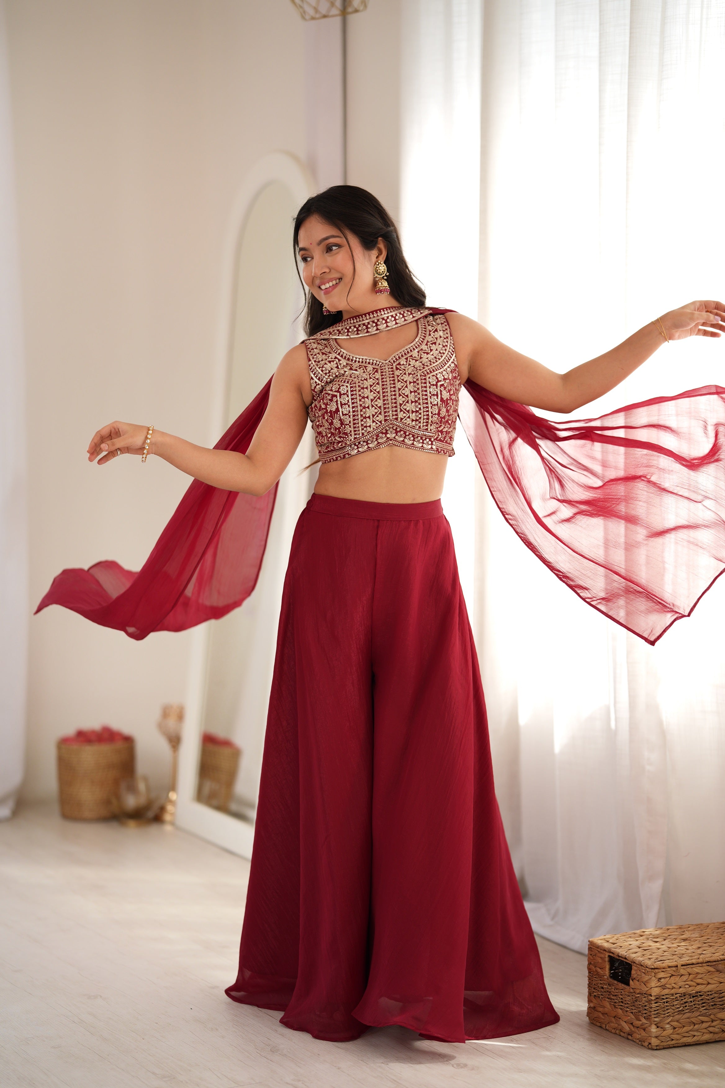 Maroon Red Pure Crunch Silk Flared Palazzo Set with Heavy Thread & Sequin Embroidered Sleeveless Crop Top Blouse, Choker Neck Accent & Matching Flowy Dupatta
