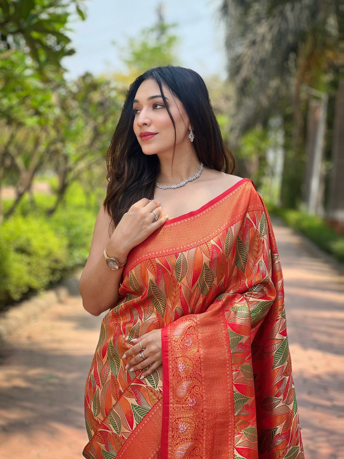 Rust Orange & Multicolour Leaf Woven Silk Saree With Zari Woven Border
