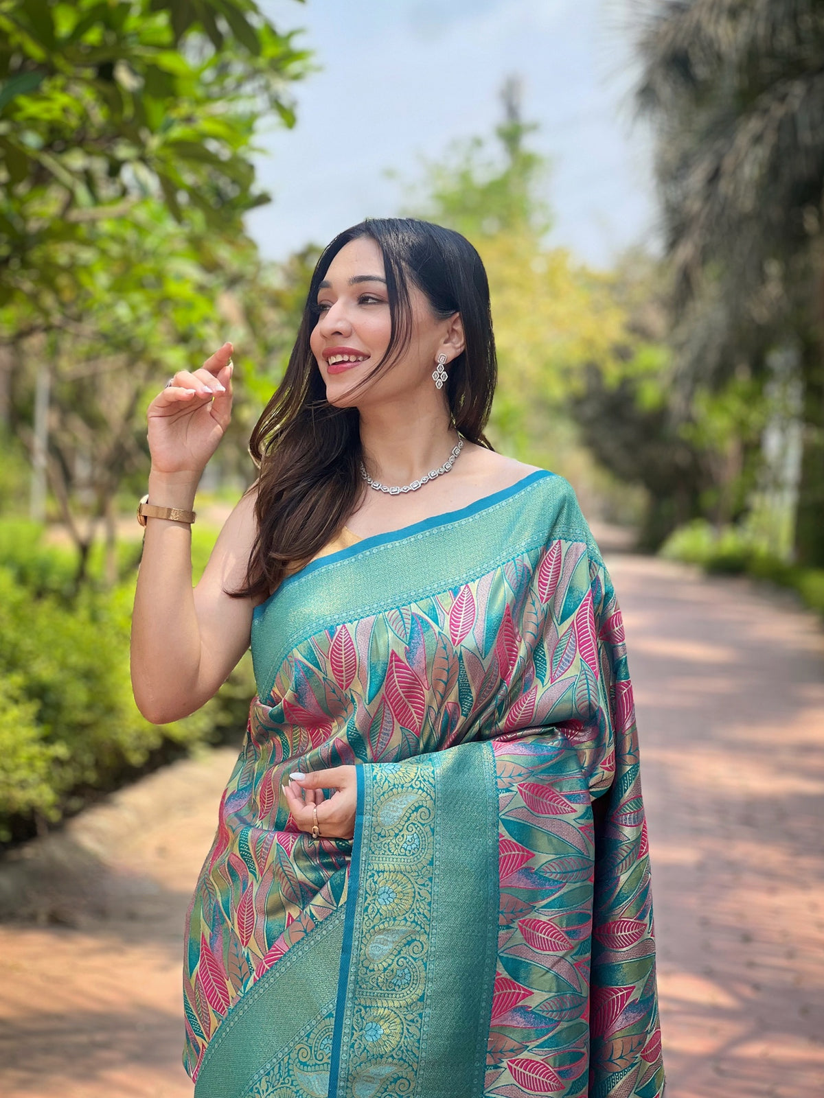 Teal Blue & Multicolour Leaf Woven Silk Saree With Zari Woven Border