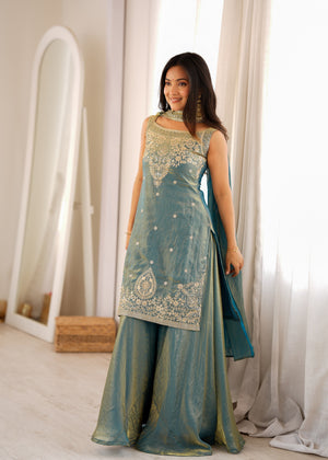 Festive teal sharara set with gold zari work for weddings and Diwali