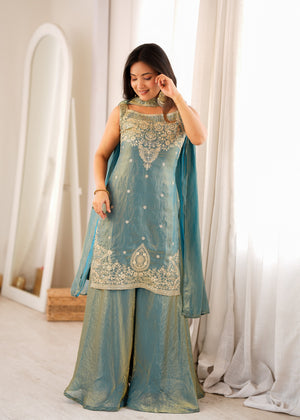 Teal blue fendy silk kurta sharara set with gold zari and sequin embroidery