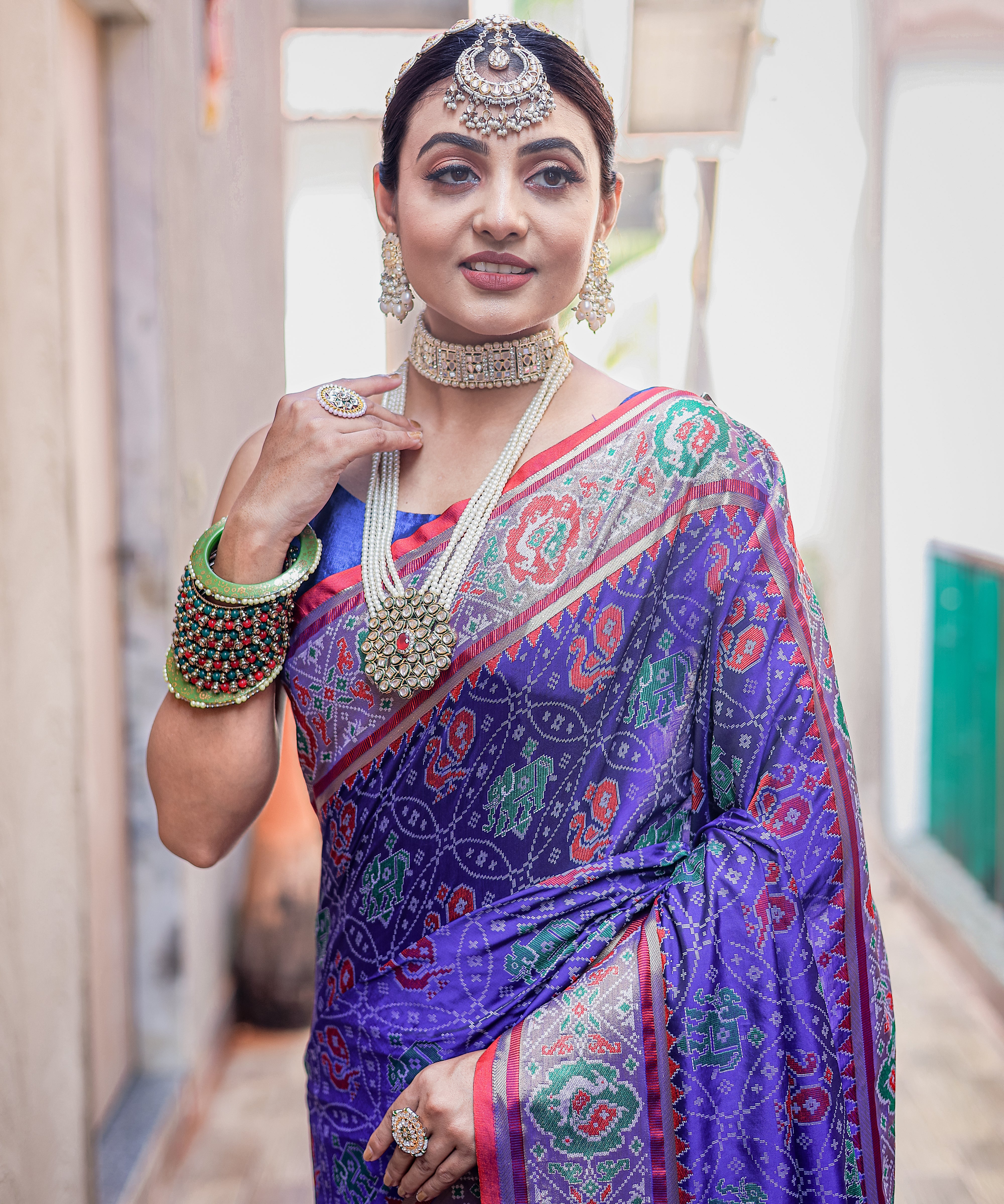 Violet Soft Elegant Patola Silk With All Over Meenakari Patola Weaving Saree