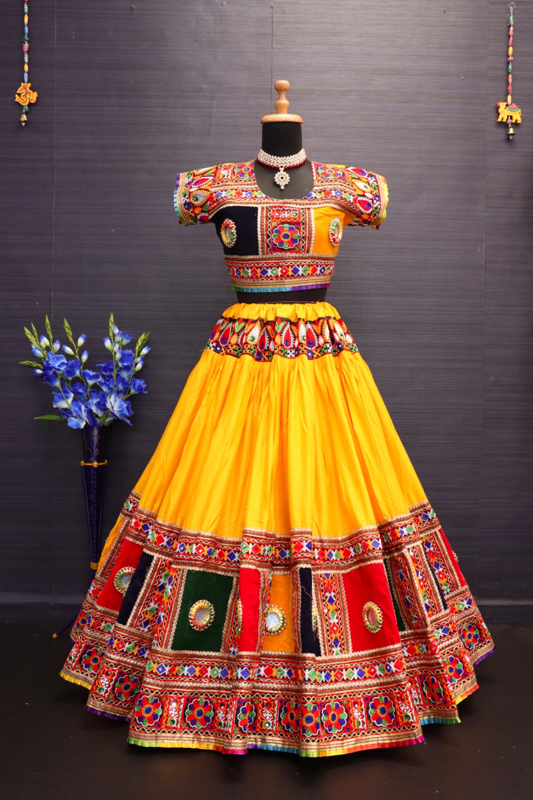 Yellow Pure Heavy Rayon Cotton With Heavy Work Border And Handmade Bangadi With Paper Mirror Work Navratri Lehenga Choli