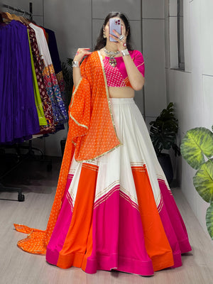 Orange and White Traditional Gamthi Work Navratri Lehenga with Real Mirror Work and Layer Patta Border by The Beauty Queen Surat