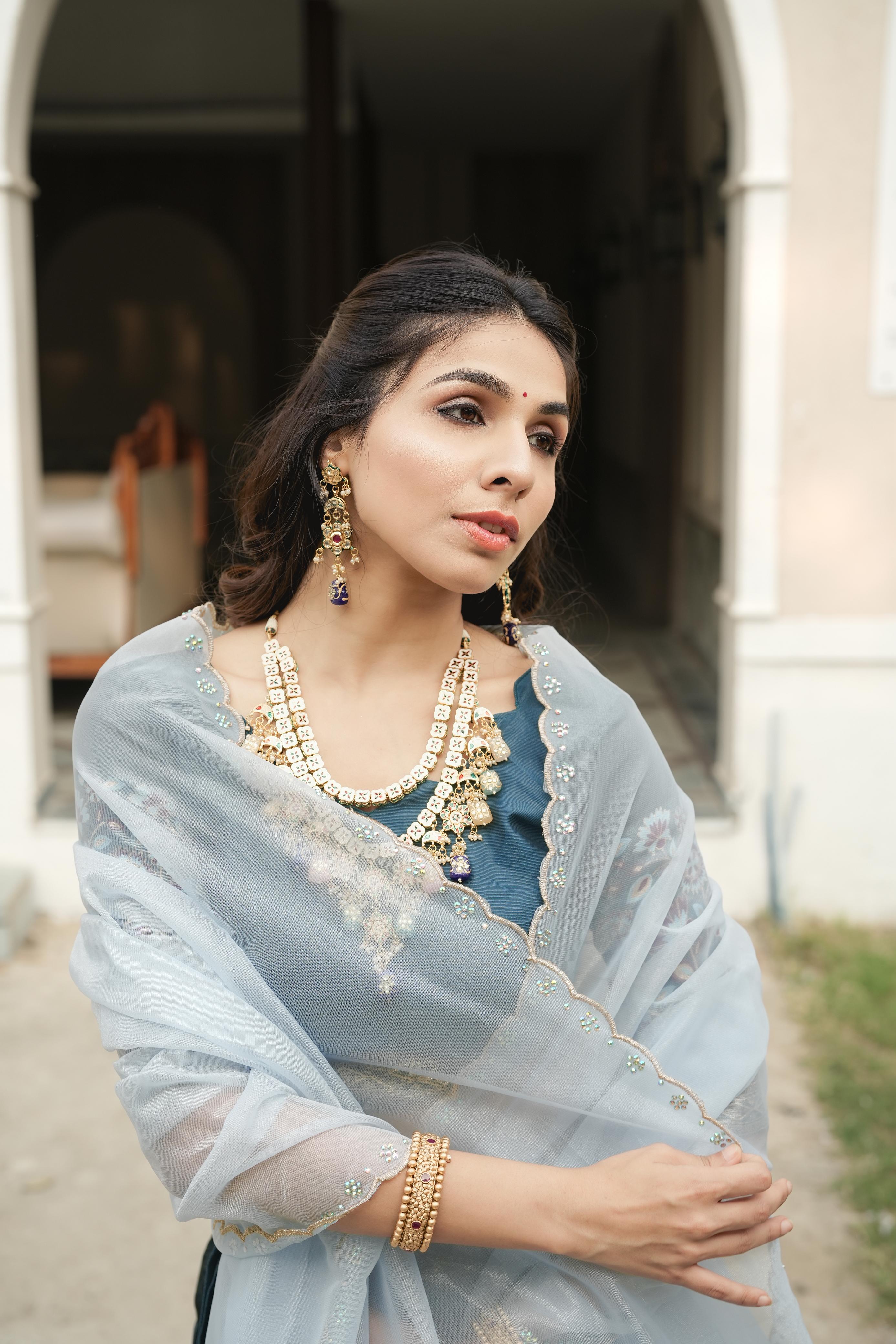Teal Blue Shimmer Lehenga Choli with Zari Weaving Border & Ice Blue Dupatta