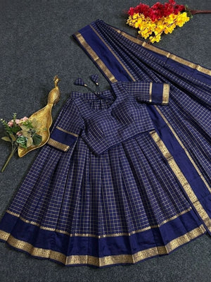 Tonal navy half saree with zari checks weaving and tassel blouse