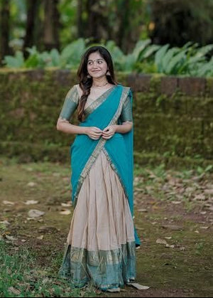 Beige Gold and Sky Blue Kanci Cotton Zari Weaving Work South Indian Half Saree Lehenga Choli Set flat lay view by The Beauty Queen