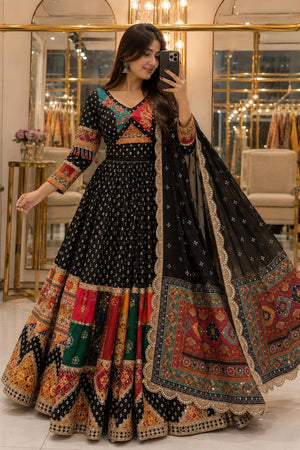 Model Taking A Mirror Selfie In Black Heavy Muslin Cotton Beautiful Digital Print & Real Mirror Work Navratri Lehenga Choli Set By The Beauty Queen