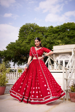 Model wearing Traditional Crimson Red Pure Chanderi Bandhej Print With Silver Lace Touch-Up Navratri Lehenga Choli Set by The Beauty Queen