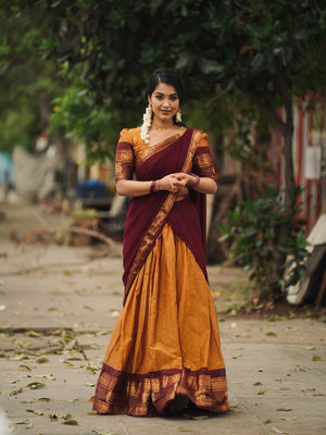 Mustard Yellow and Deep Wine Maroon Kanjivaram Silk Zari Weaving Work South Indian Half Saree Langa Voni Set flat lay view by The Beauty Queen