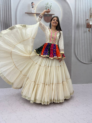 Model Wearing Off-White Pure Cotton Gamthi And Mirror Work Navratri Lehenga Choli Set With Bandhani Frill By The Beauty Queen