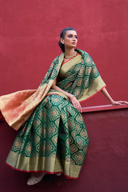 Green Colored Festive Wear Patola Woven Silk Saree