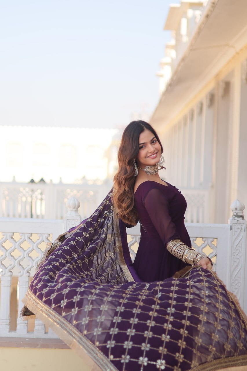 Wine Faux Blooming Gown With Dupatta With Attractive Embroidered Sequins Work With Lace Border