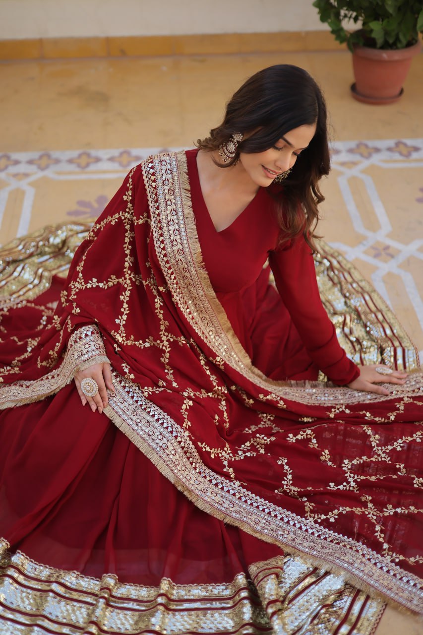 Maroon Colour Faux Blooming With Embroidery Zari Sequins Work Gown With Dupatta