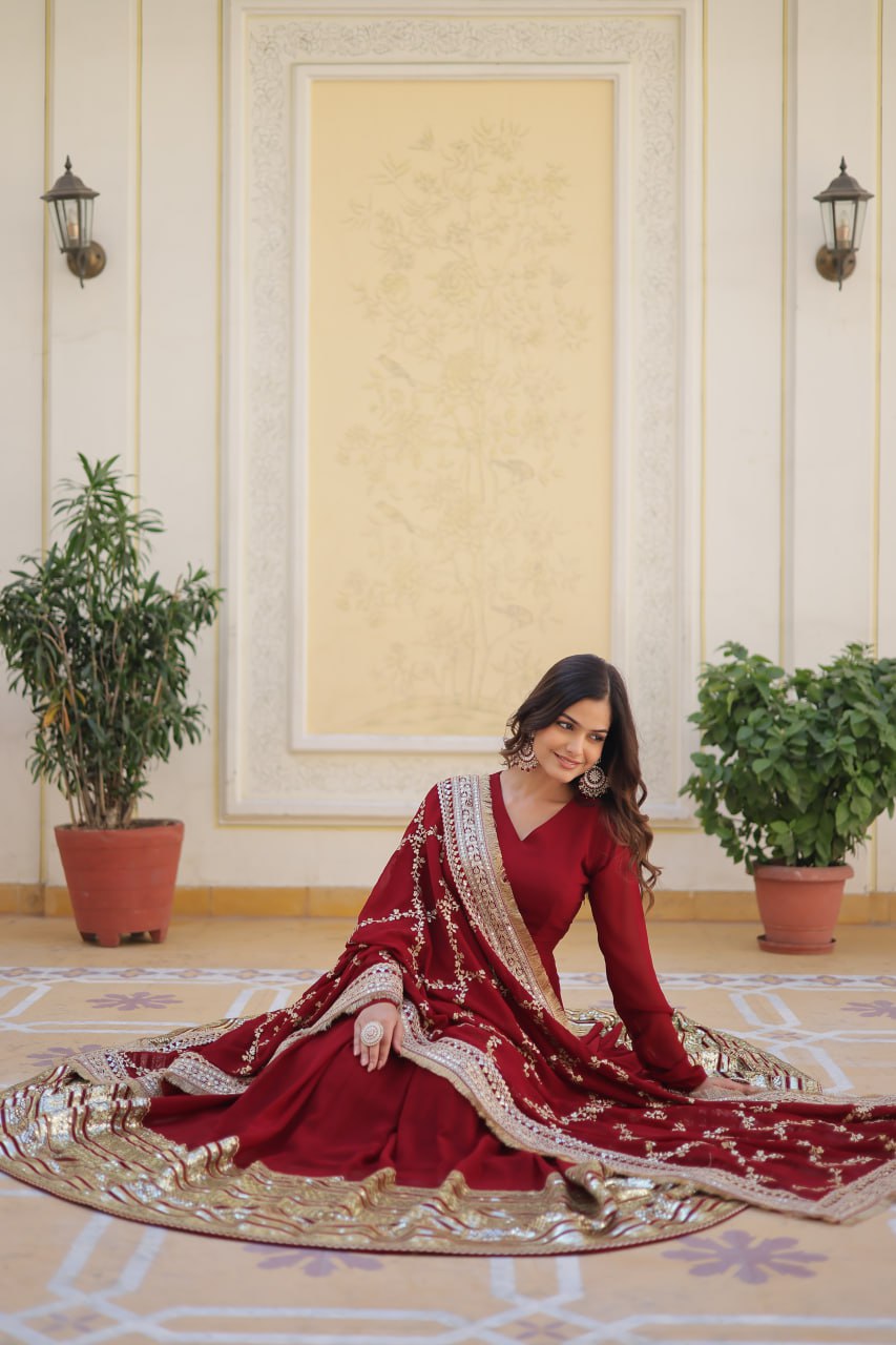 Maroon Colour Faux Blooming With Embroidery Zari Sequins Work Gown With Dupatta