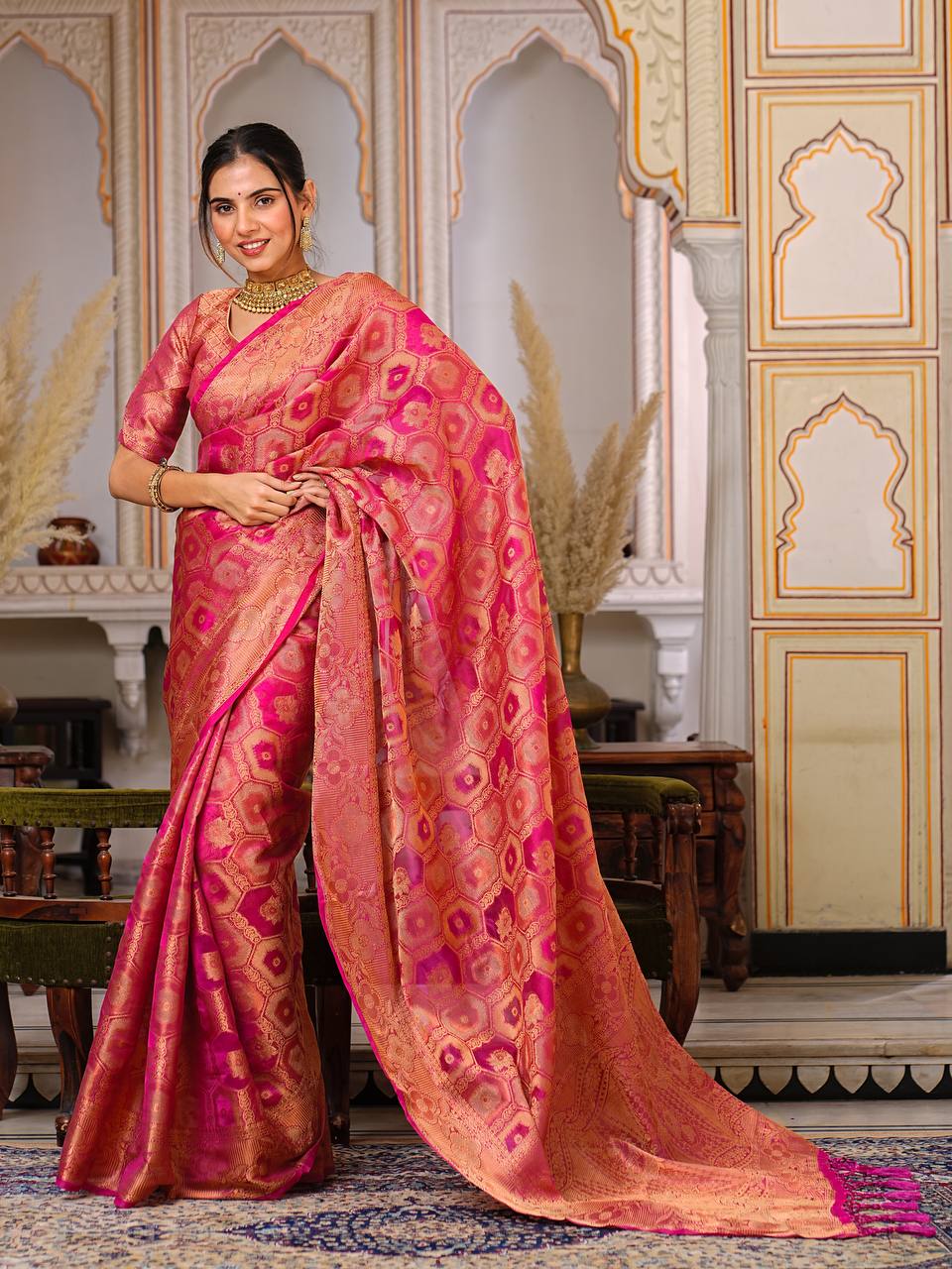 Pure Organza Saree Exuding Regal Charm With Its Rich Pallu And Intricate Brocade