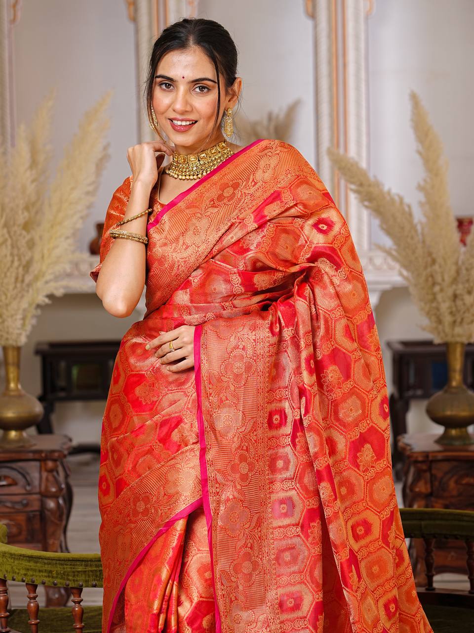 Pure Organza Saree Exuding Regal Charm With Its Rich Pallu And Intricate Brocade