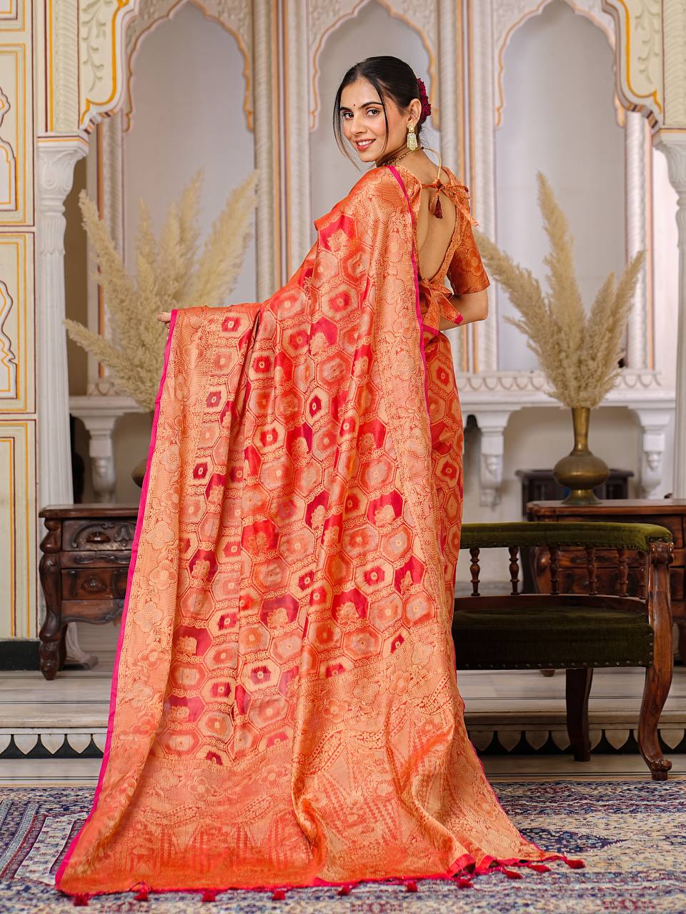 Pure Organza Saree Exuding Regal Charm With Its Rich Pallu And Intricate Brocade