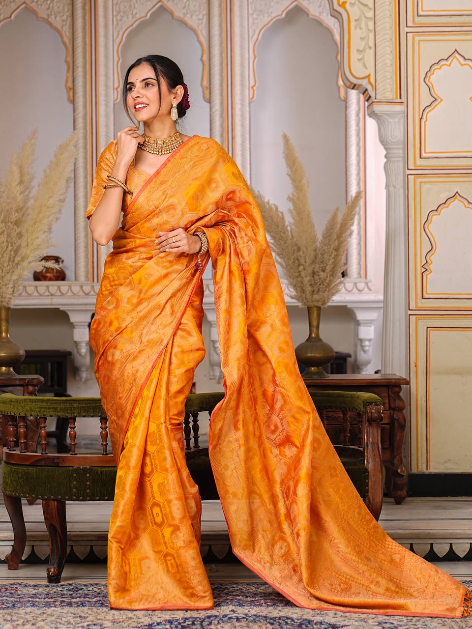 Pure Organza Saree Exuding Regal Charm With Its Rich Pallu And Intricate Brocade