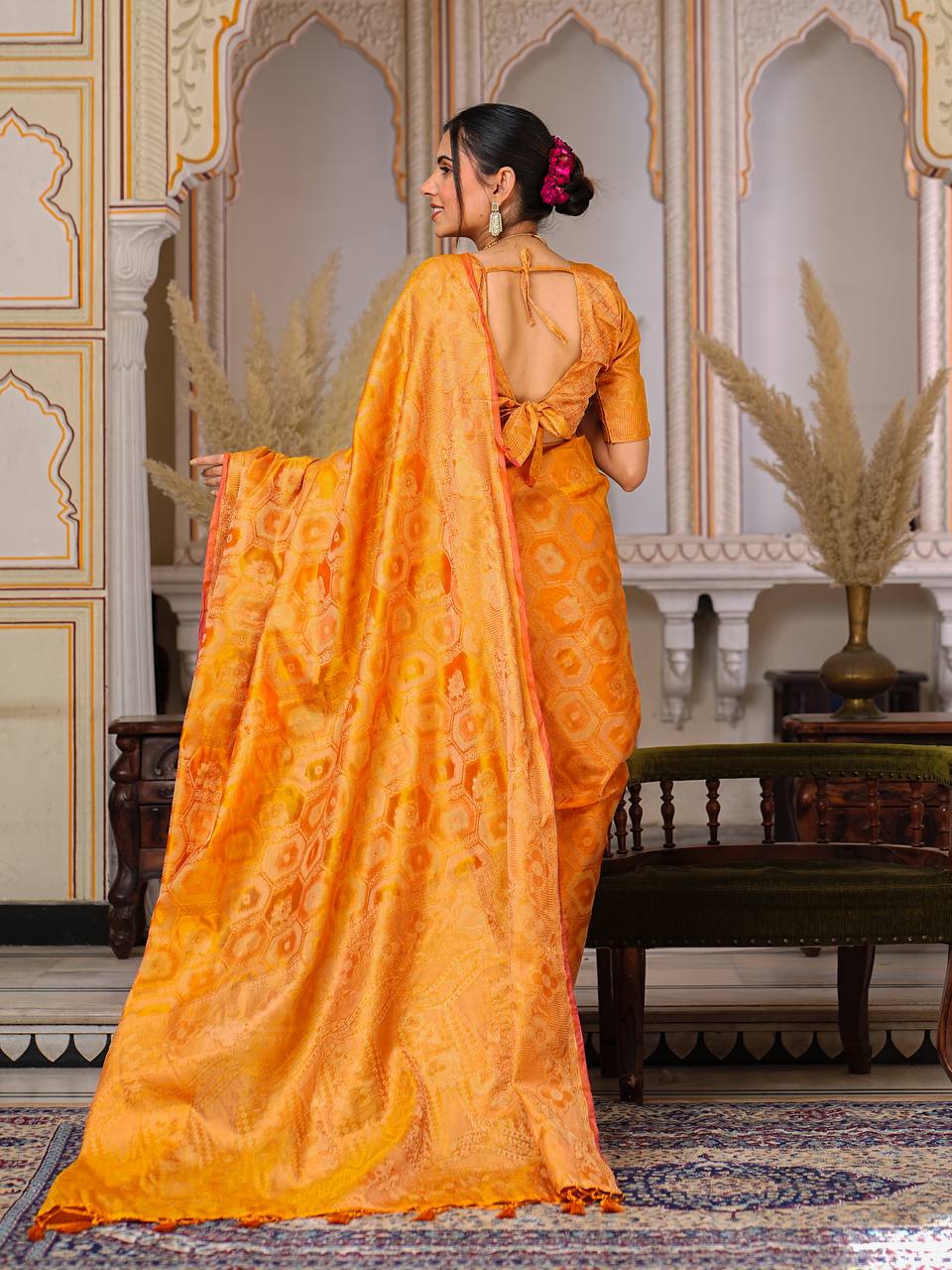 Pure Organza Saree Exuding Regal Charm With Its Rich Pallu And Intricate Brocade