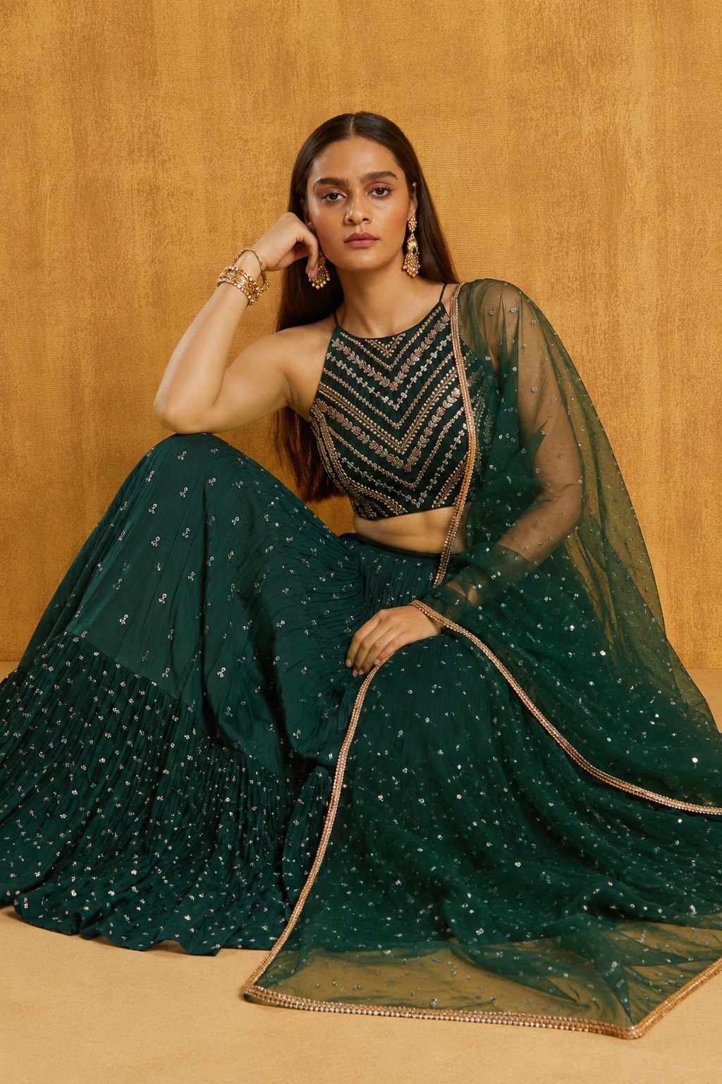 Emerald Forest Green Georgette Tiered Ruffle Flared Lehenga Choli Set with Zari, Chevron Sequins Embroidered Halter Neck Blouse & Sheer Net Dupatta