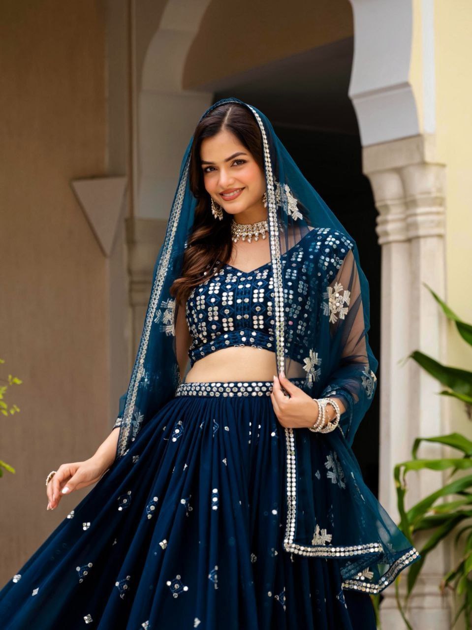 Midnight Navy Blue Faux Georgette Heavy Flared Lehenga Choli Set with Zari & Mirror-Style Sequin Embroidery, Heavily Embellished Sleeveless Blouse & Sheer Net Dupatta