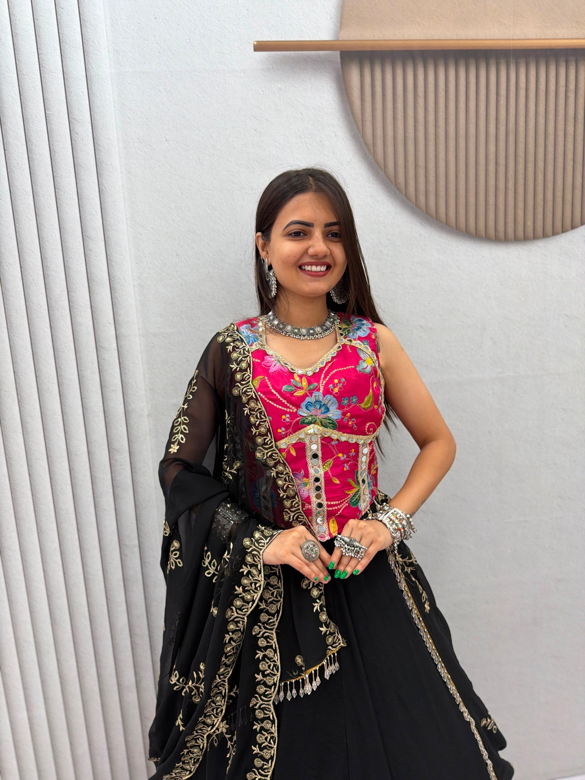 Black Pure Cotton Navratri Lehenga Choli with Rani Pink Silk Real Mirror Work Position Print Border & Embroidered Net Dupatta