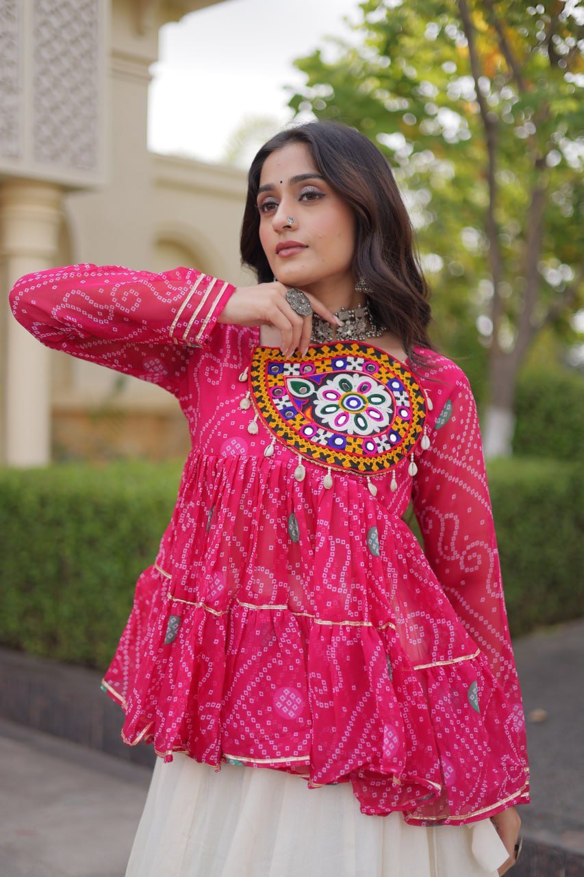 Rani Pink Bandhani Peplum Choli & Off-White Kora Cotton Navratri Lehenga Set With Gota Lace