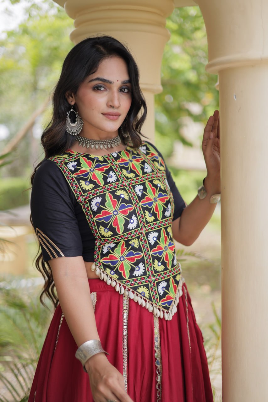Maroon & Black Rayon Navratri Lehenga Choli With Multi Mirror Lace Work, Attached Chain Detail & Tassels