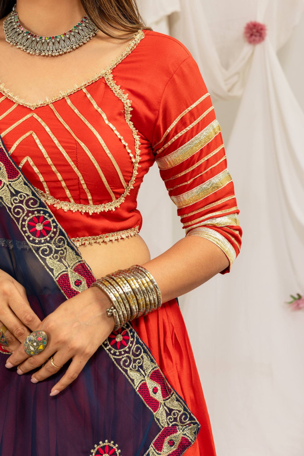Rust Orange & Navy Blue Pure Rayon Navratri Lehenga Choli With Bold Gold Circle Gota Work, Canvas Flounce & Drawstring