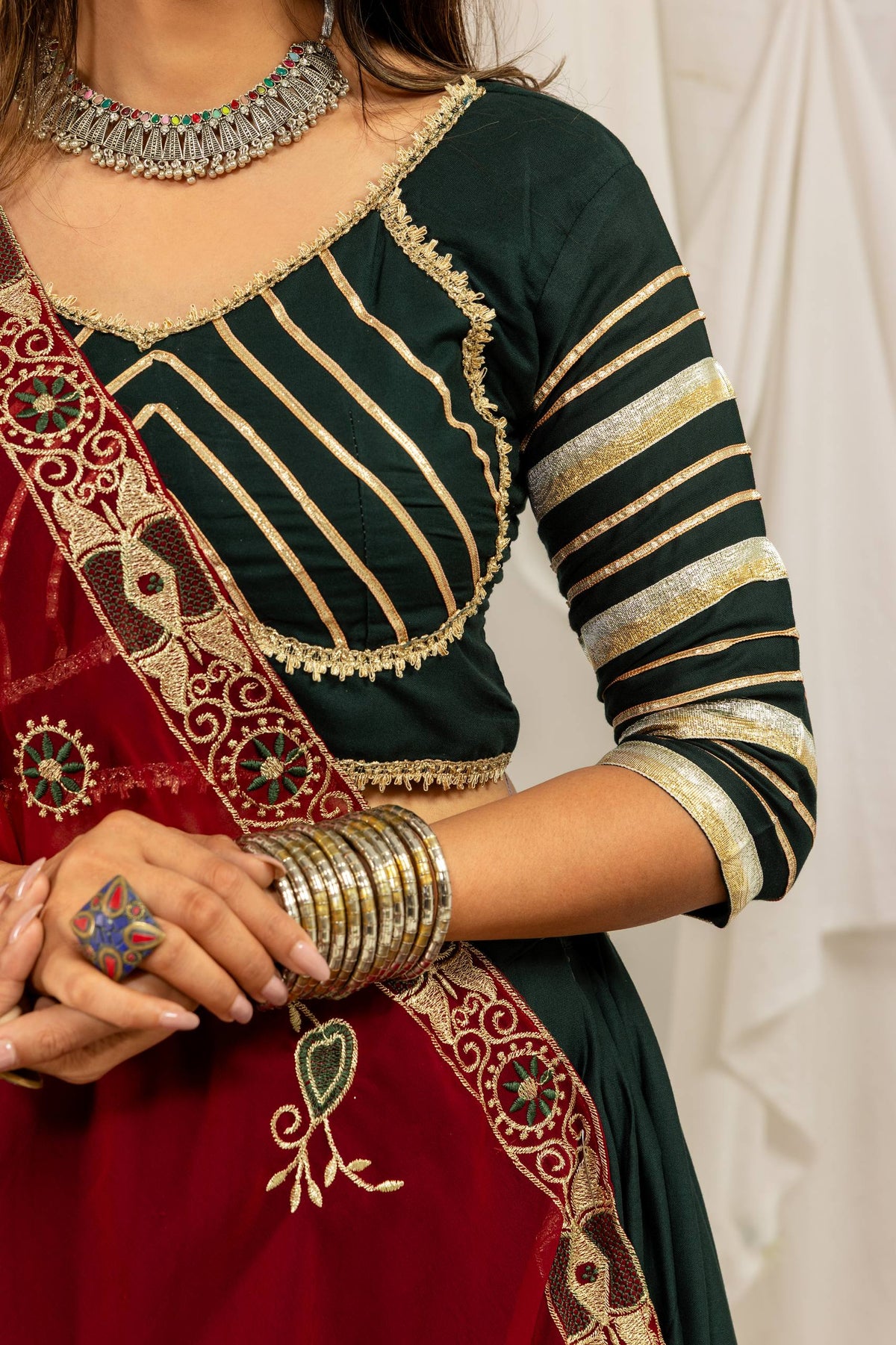 Dark Green & Maroon Pure Rayon Navratri Lehenga Choli With Bold Gold Circle Gota Work, Canvas Flounce & Drawstring