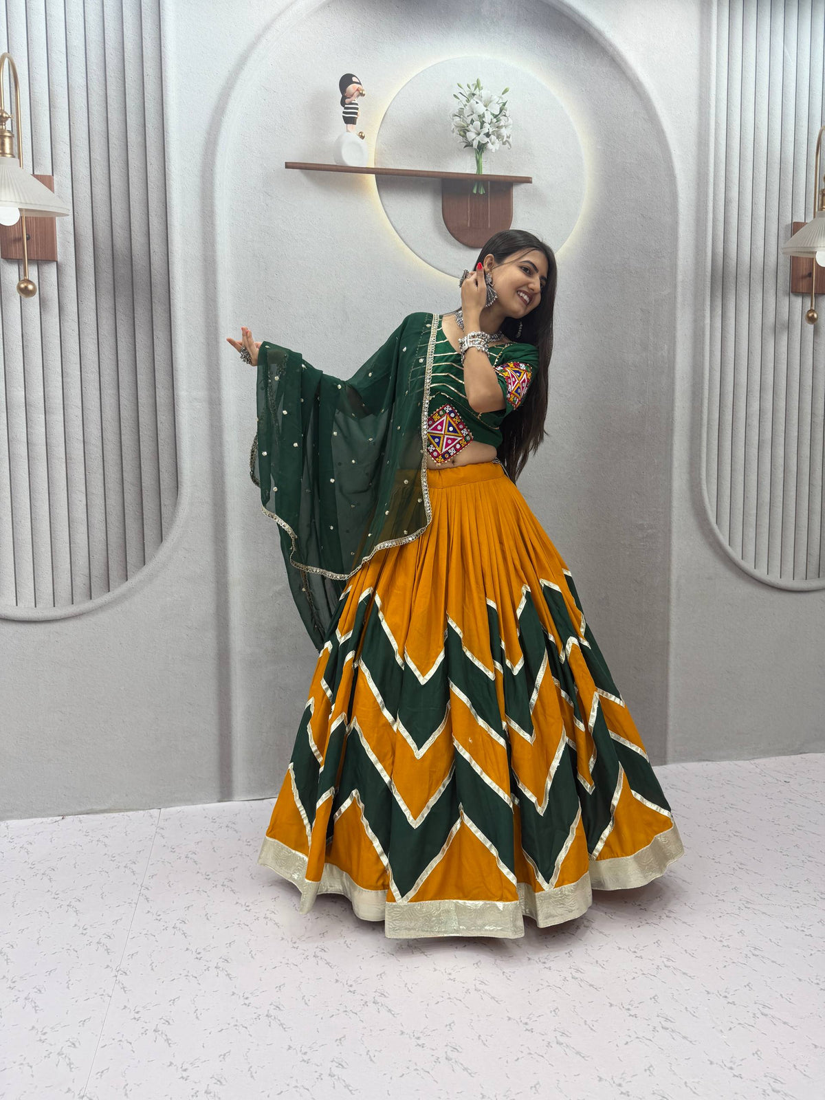Mustard Yellow & Dark Green Rayon Cotton Zig-Zag Chevron Pattern Navratri Special Flared Lehenga Choli Set With Real Mirror Work Blouse & Dupatta
