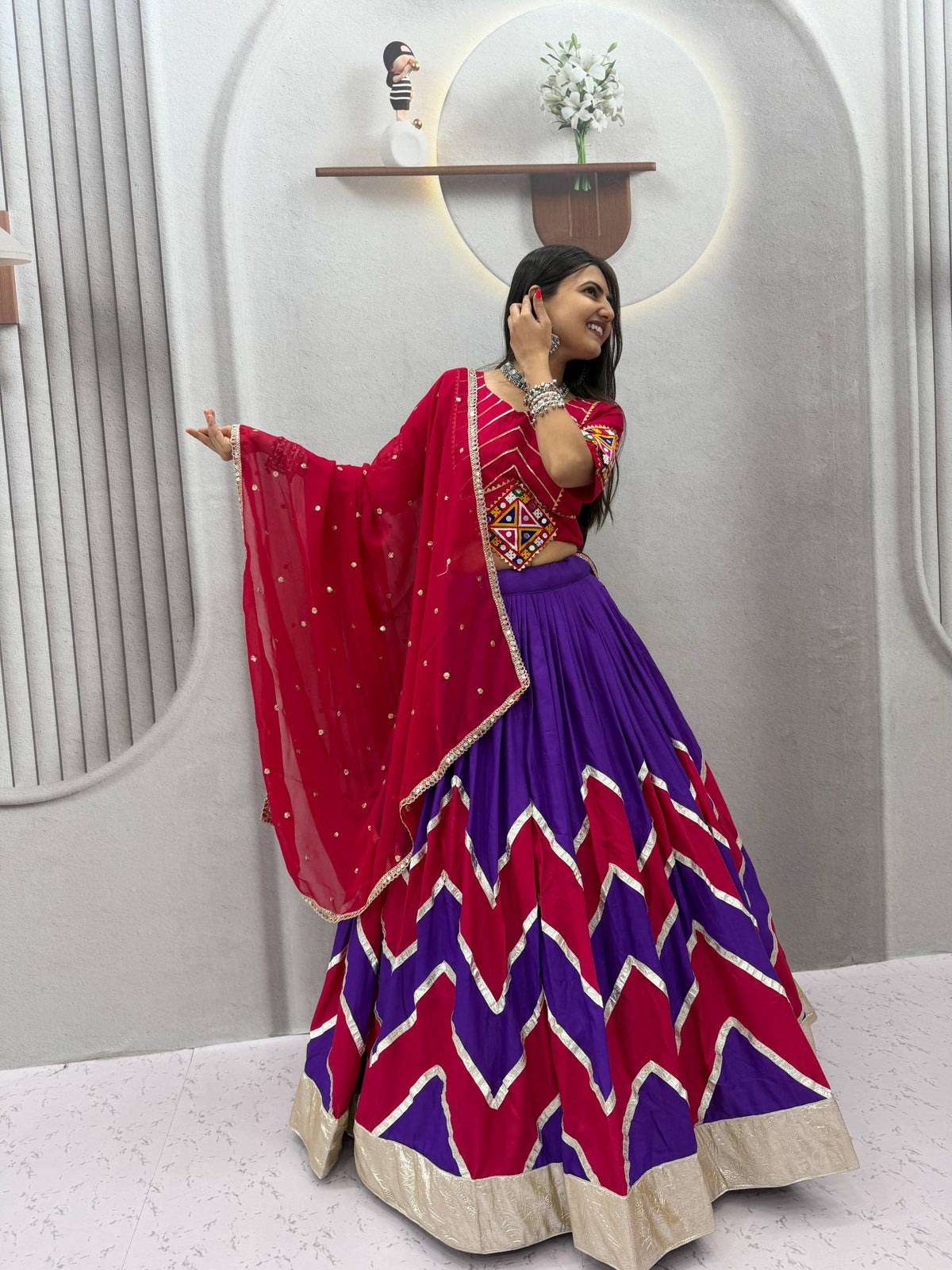 Royal Purple & Rani Pink Rayon Cotton Zig-Zag Chevron Pattern Navratri Special Flared Lehenga Choli Set With Real Mirror Work Blouse & Dupatta
