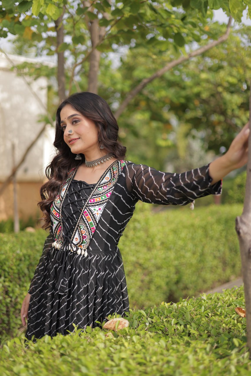 Black Laheriya Print Faux Georgette Navratri Gown With Kutchi Patchwork Yoke & Shell Tassels