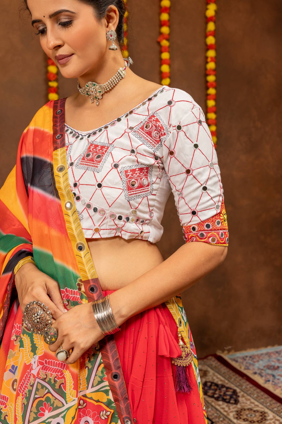 Vibrant Red Faux Georgette Flared Lehenga With Small Diamond Accents, Gota Work, Canvas Patta & Multi-Color Printed Dupatta Navratri Lehenga Choli