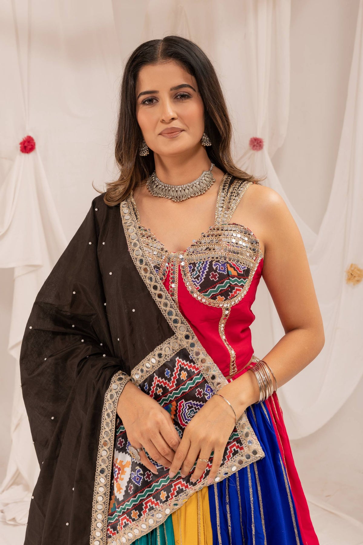 Multi-Color Panel Pure Rayon Embroidered Lehenga With Real Mirror Work, Patola Print Border & Black Dupatta Navratri Lehenga Choli