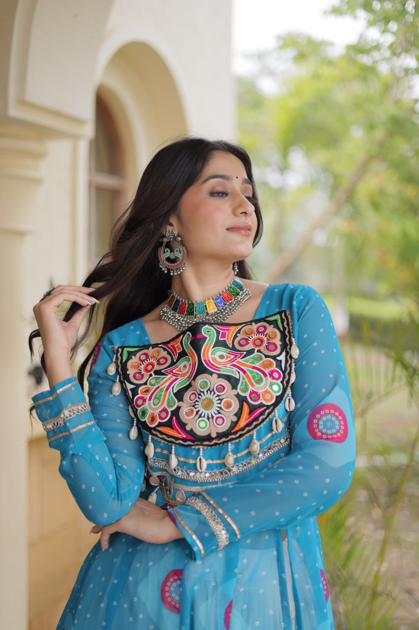 Teal Blue Bandhani Print Faux Georgette Kurti With Kutchi Patchwork & Off-White Flared Lehenga Set