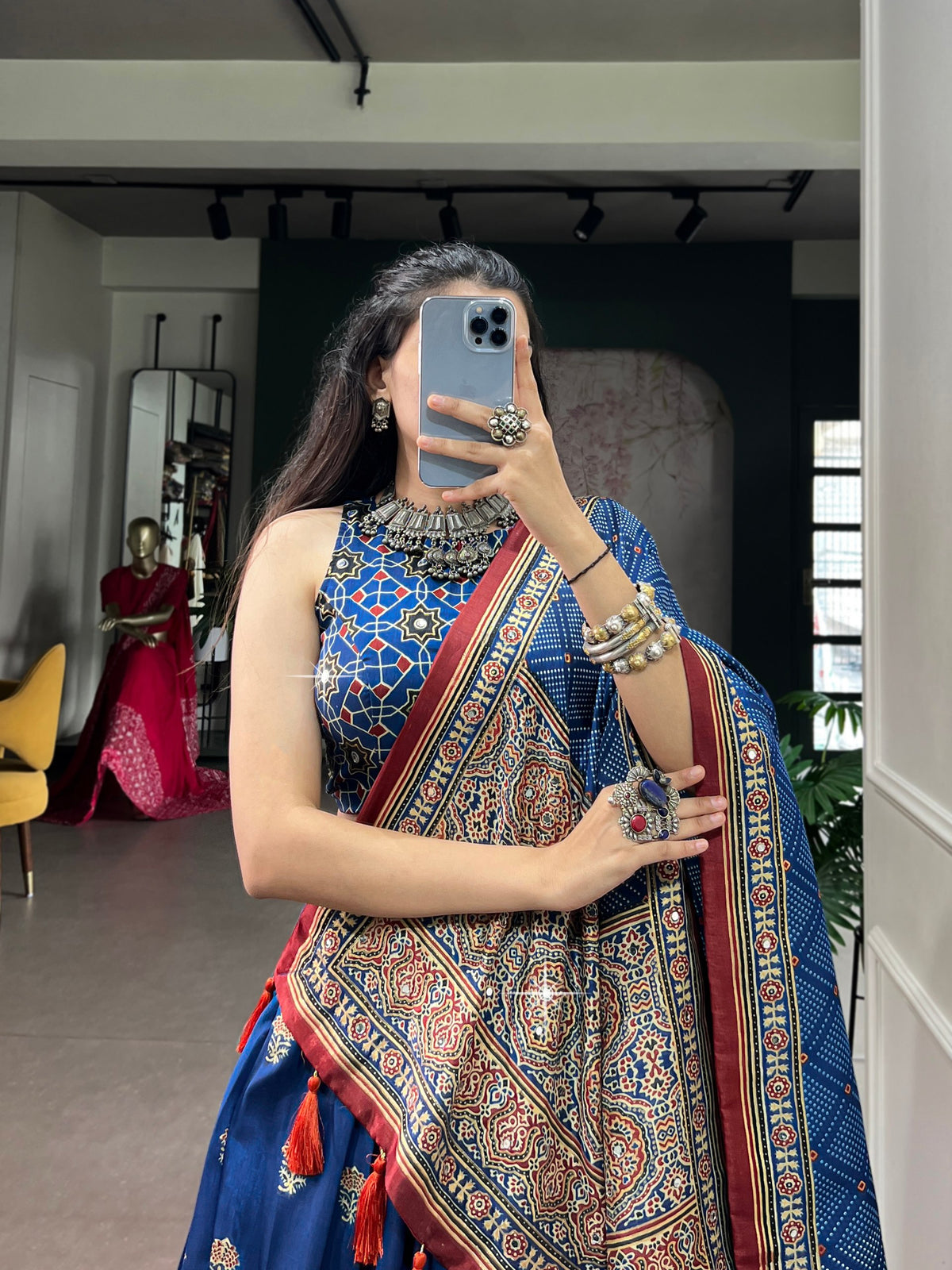 Royal Blue & Maroon Tussar Silk Ajrakh Block Printed Navratri Lehenga Choli Set With Real Mirror Work & Orange Tassel Detailing
