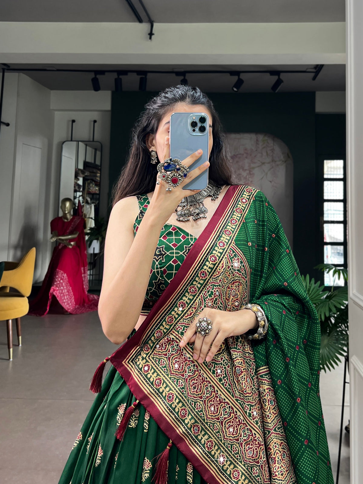 Bottle Green & Maroon Tussar Silk Ajrakh Block Printed Navratri Lehenga Choli Set With Real Mirror Work & Tassel Detailing