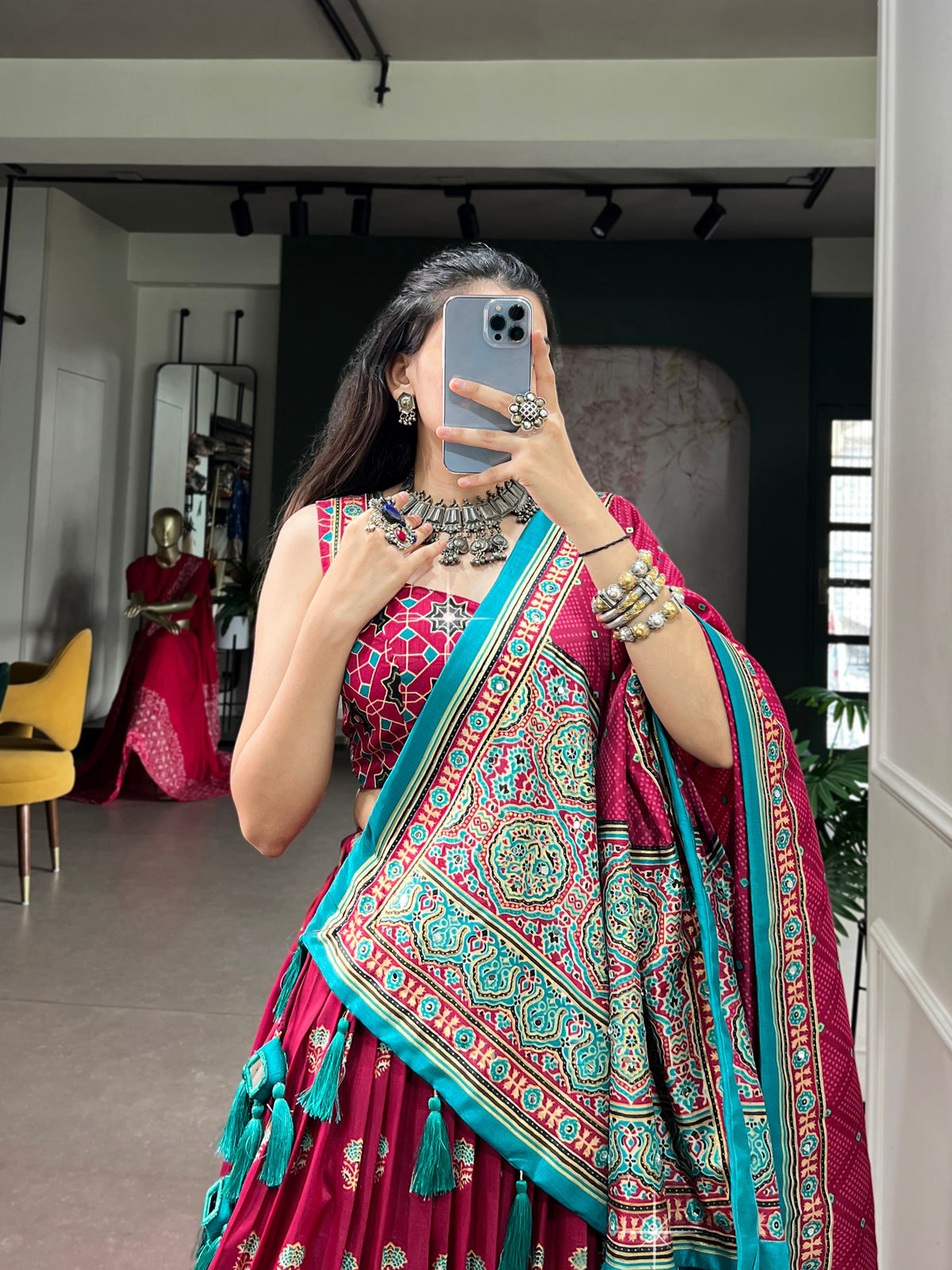Magenta Pink & Teal Tussar Silk Ajrakh Block Printed Navratri Lehenga Choli Set With Real Mirror Work & Tassel Detailing