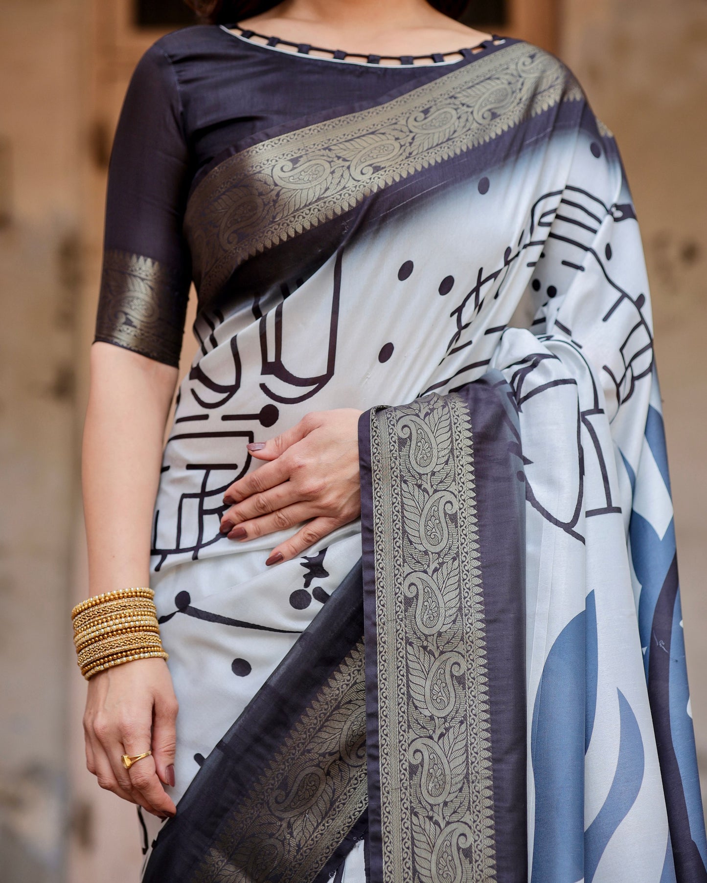 PURE SILK DIGITALLY PRINTED SAREE WEAVED WITH GOLDEN ZARI COMES WITH TASSELS
