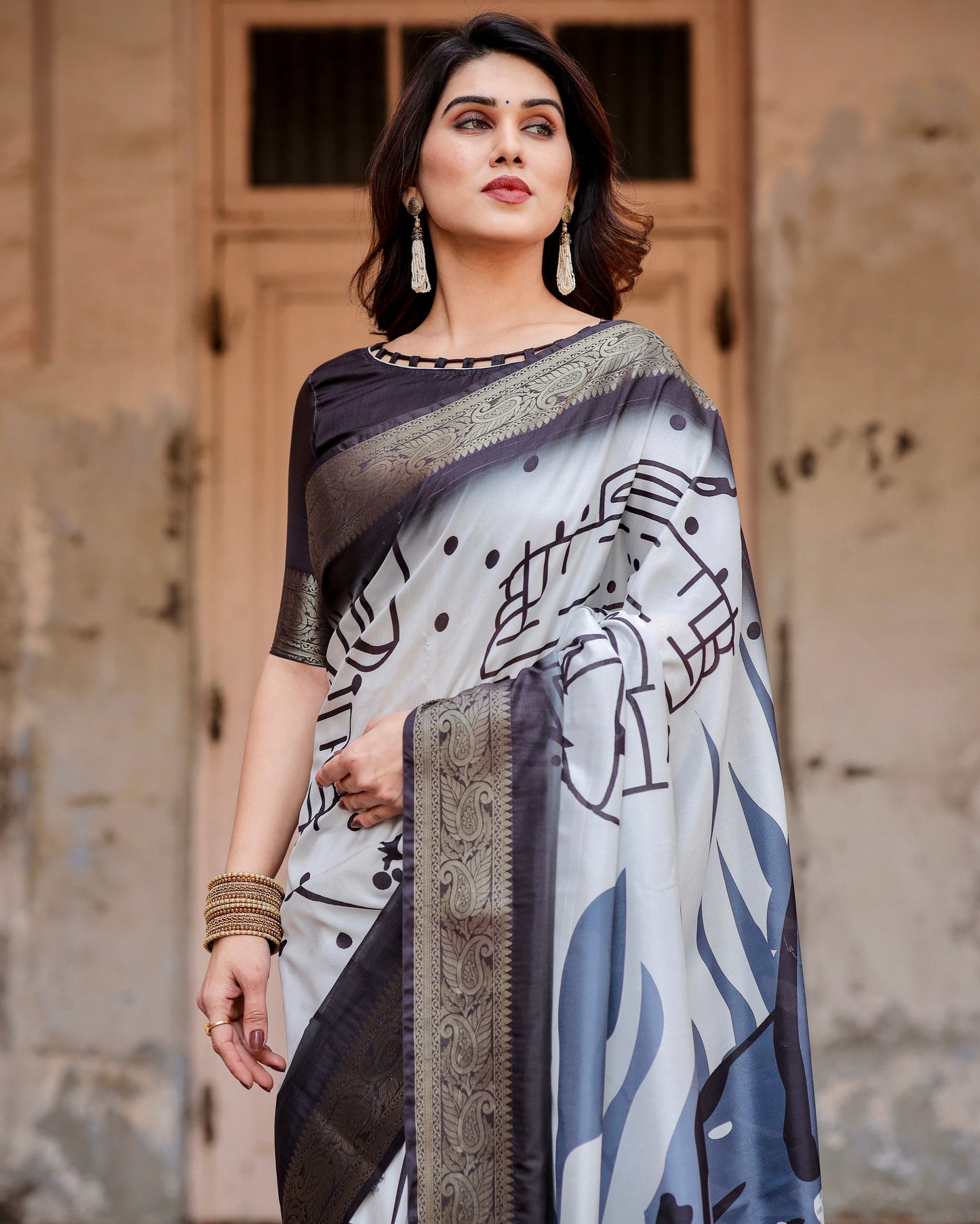 PURE SILK DIGITALLY PRINTED SAREE WEAVED WITH GOLDEN ZARI COMES WITH TASSELS