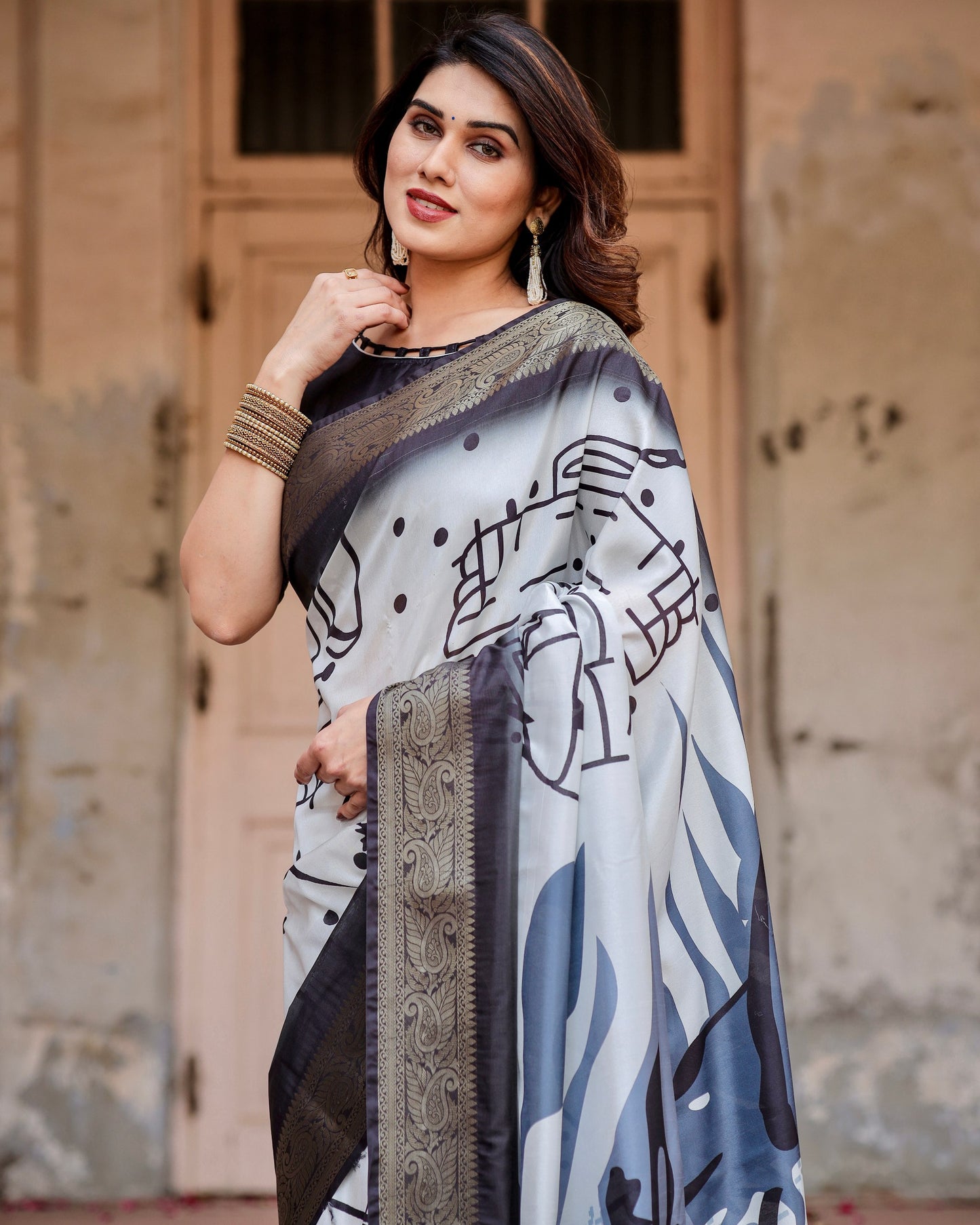 PURE SILK DIGITALLY PRINTED SAREE WEAVED WITH GOLDEN ZARI COMES WITH TASSELS