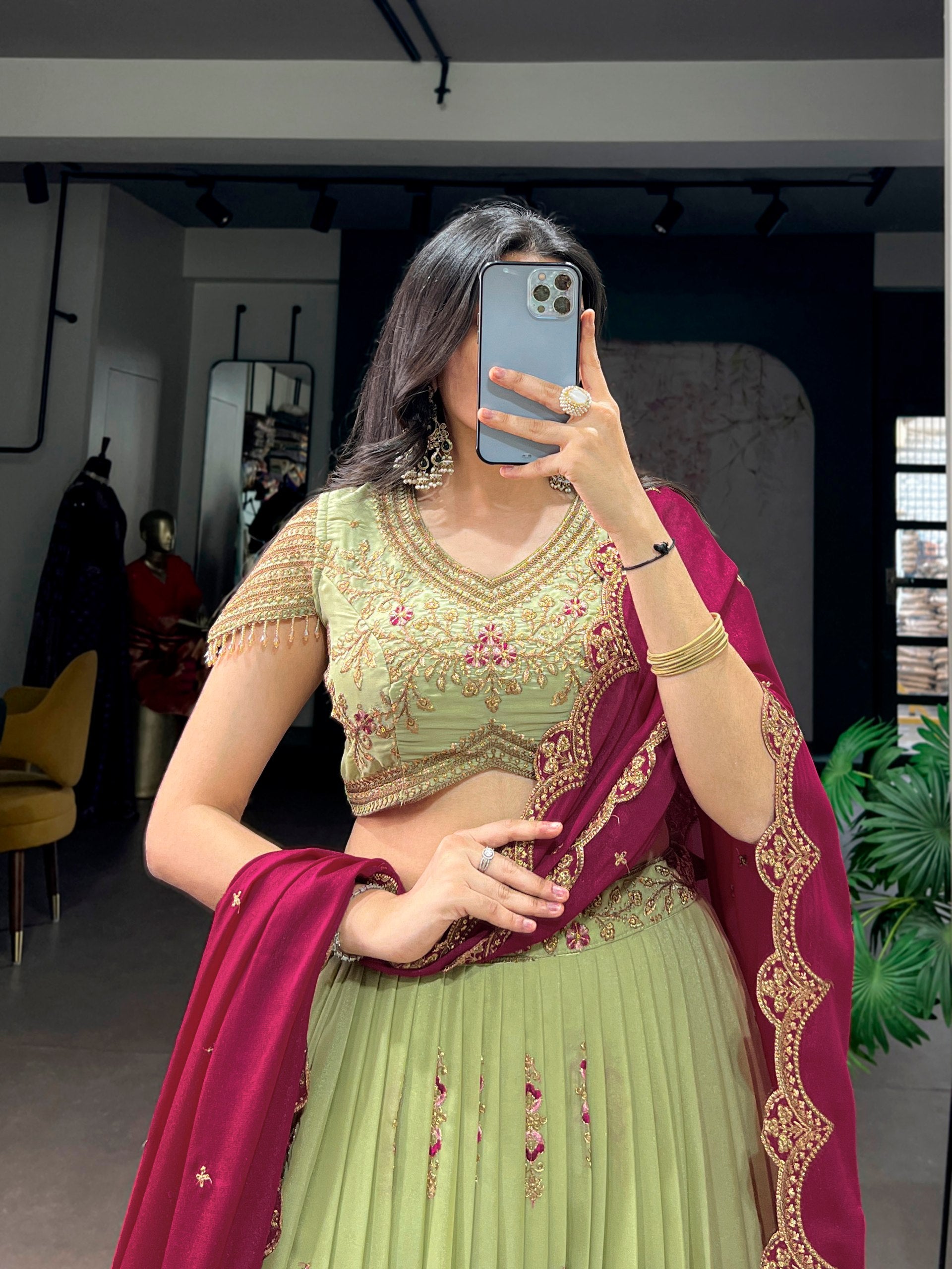 Pistachio Light Green Star Georgette Flared Lehenga Choli Set with Heavy Zari, Sequins & Resham Embroidery, Butti Work, Arca Border & Magenta Pink Scalloped Dupatta