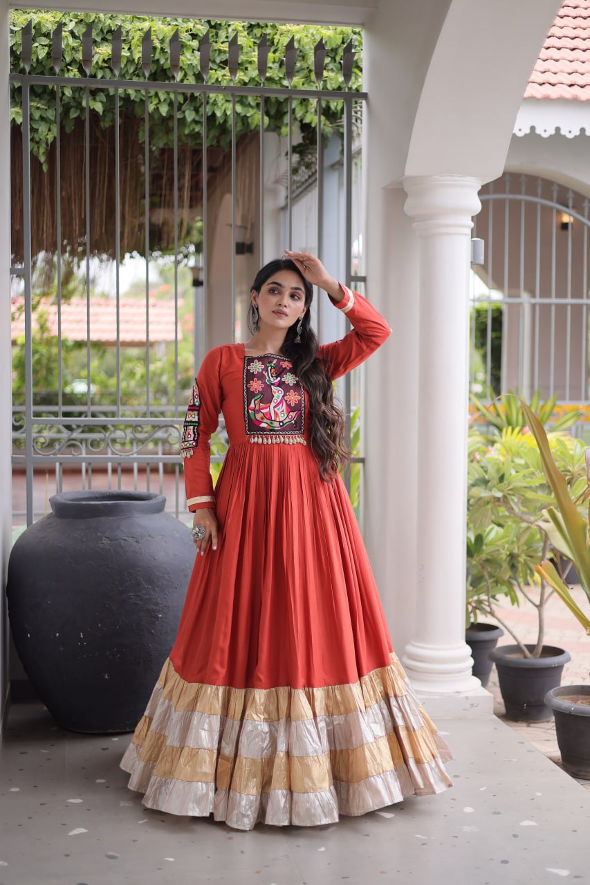 Navratri Rust Orange Heavy 14 Kg Rayon Flared Anarkali Gown with Kutchi Gamthi Thread Work & Metallic Tiered Ruffle Border