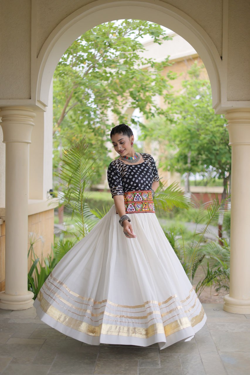 Navratri Off-White Kora Cotton Flared Lehenga Set with Gota Patti Lace Work & Black Bandhani Embroidered Blouse